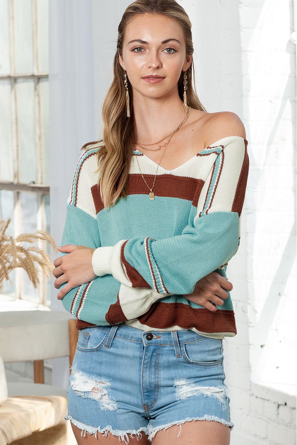 Sky blue and rust v neck sweater