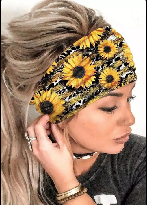 Wide black headband with sunflower graphic print