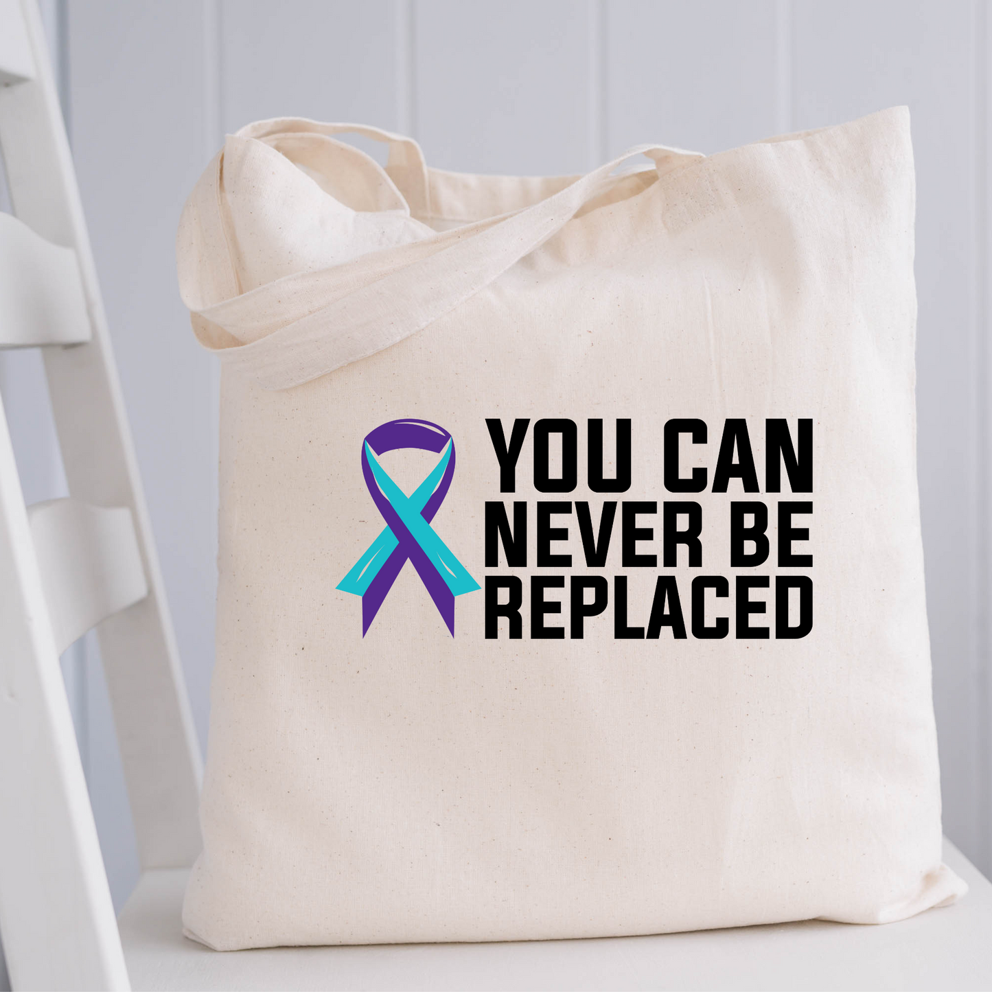 You can never be  replaced Canvas Tote
