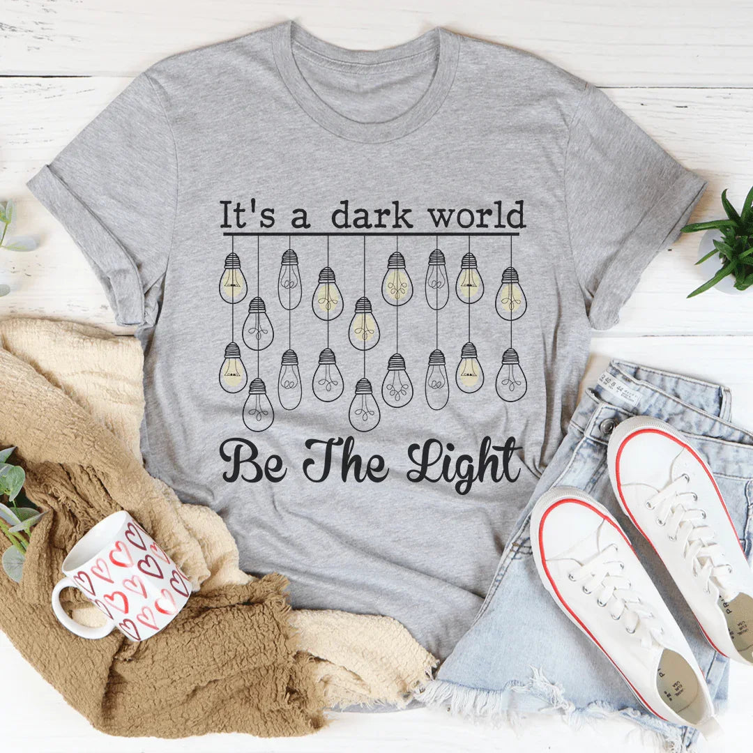 It's A Dark World Be The Light Tee
