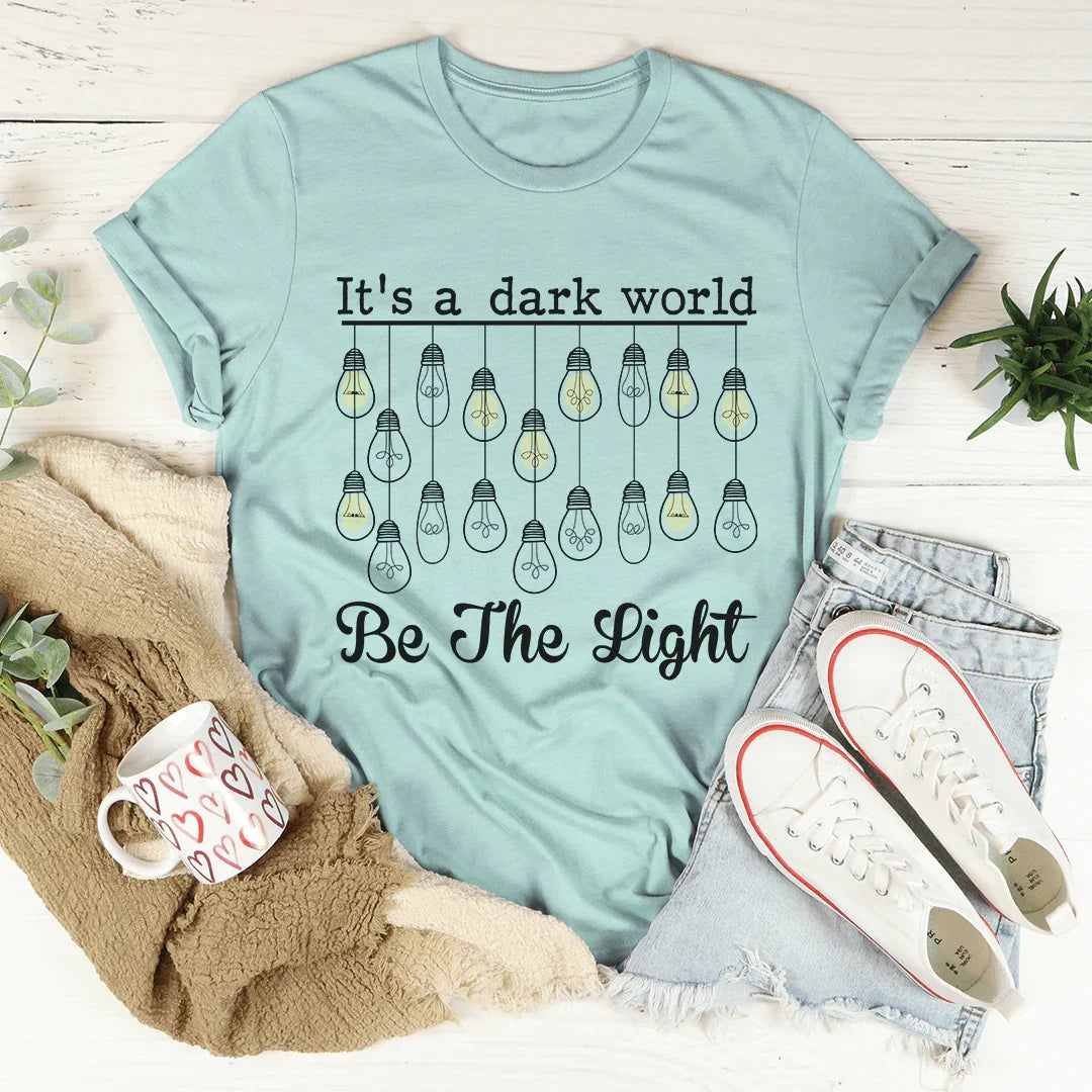 It's A Dark World Be The Light Tee