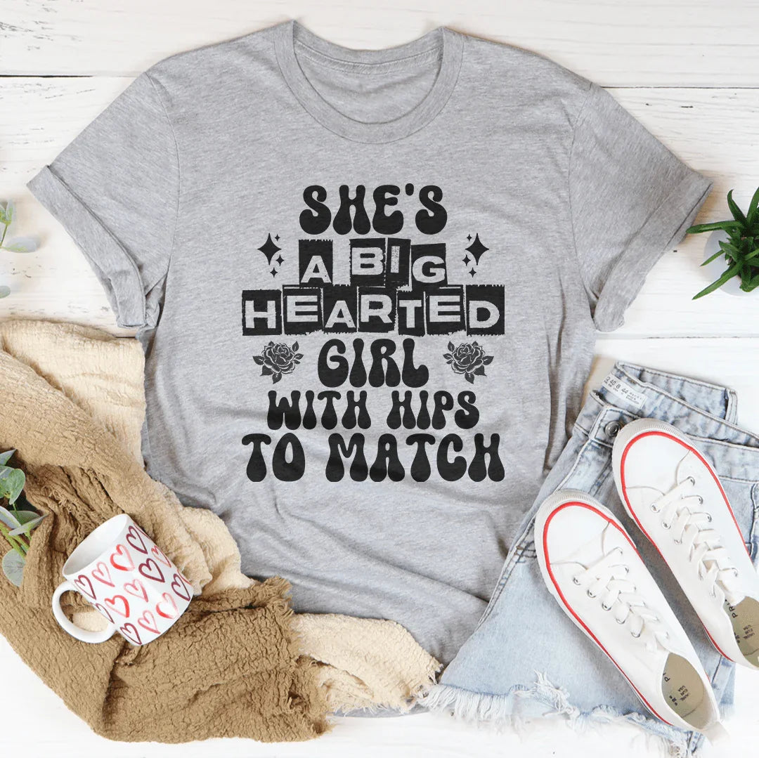 She's a big hearted girl with hips to match Tee
